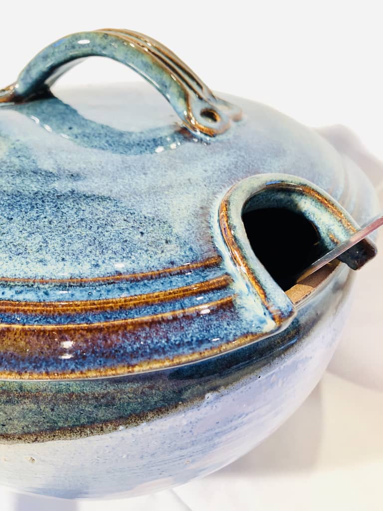 Details of the colors created by the routil blue glaze on the lid of a soupterine
