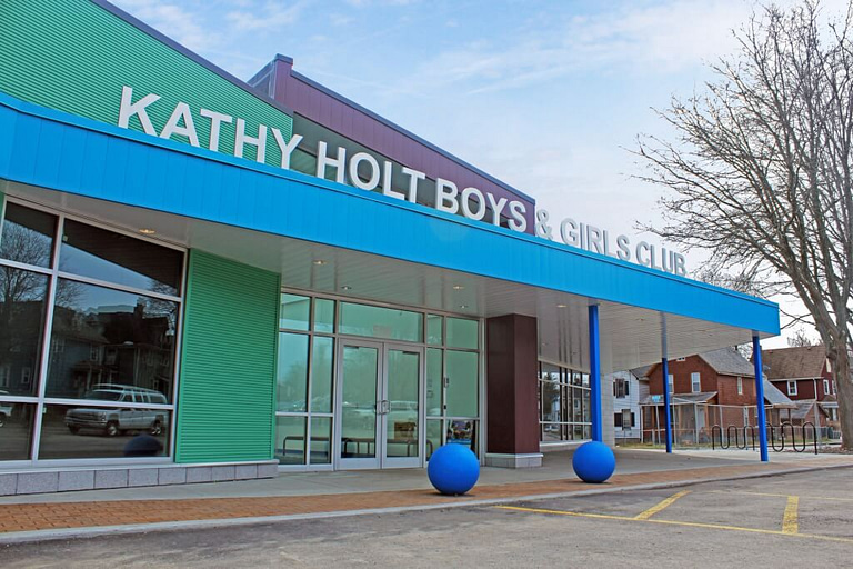 Exterior view front entrance Boys and Girls Club of Rochester NY bright colors bold signage
